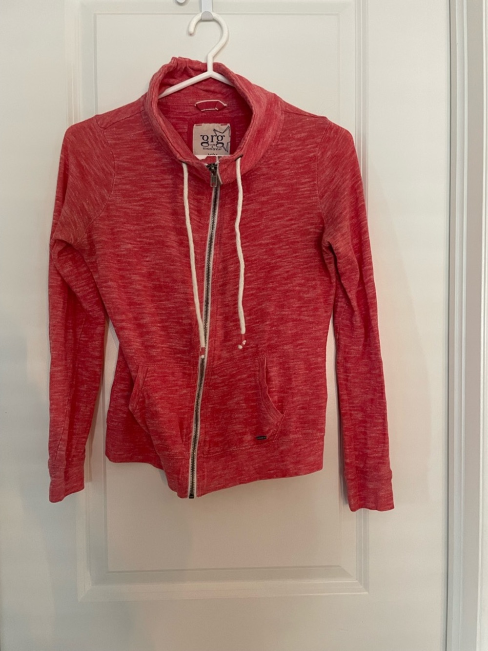 Coral pink zip-up sweatshirt with drawstring